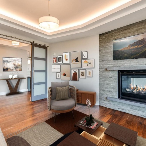 Access to resident-only features a living room with a fireplace