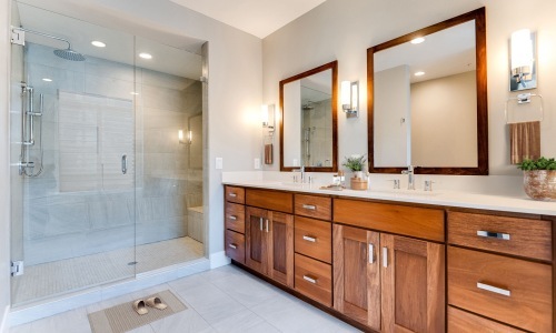 Bathroom options with thoughtful details bathroom with mirrors drawers and shower