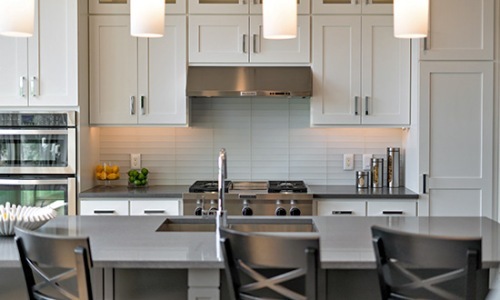Beautiful kitchens with designer finishes kitchen with white cabinets and stainless steel appliances