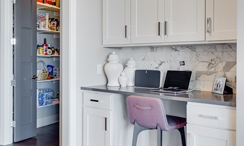 All the comforts of luxury living a small office in a kitchen area