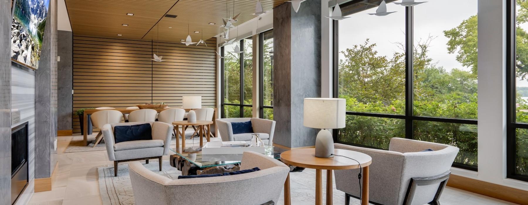 a living room tv with large windows